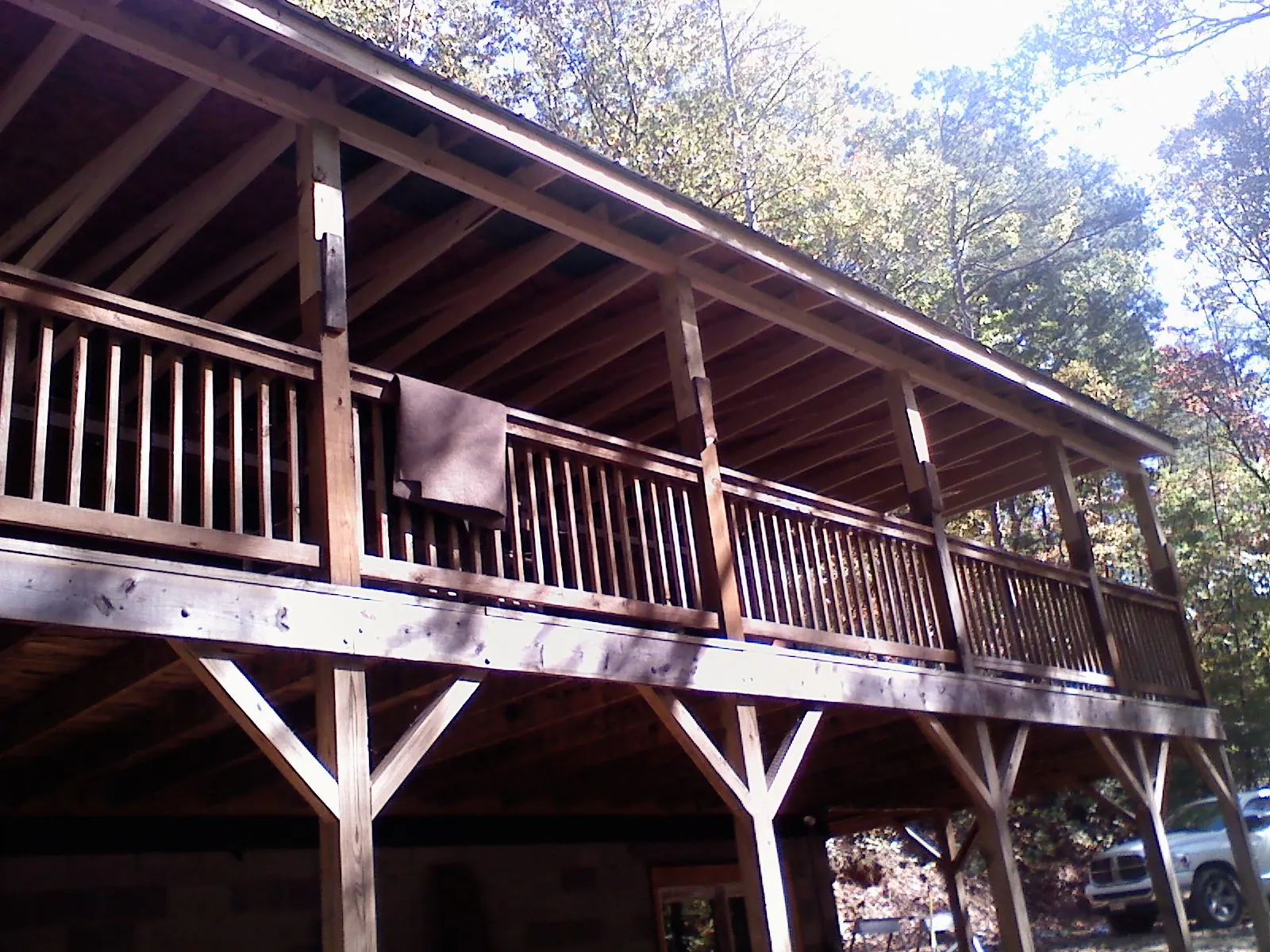 Timber framing under a new elevated porch and deck — Roof Leak Repair in Ione by Roofing Brothers